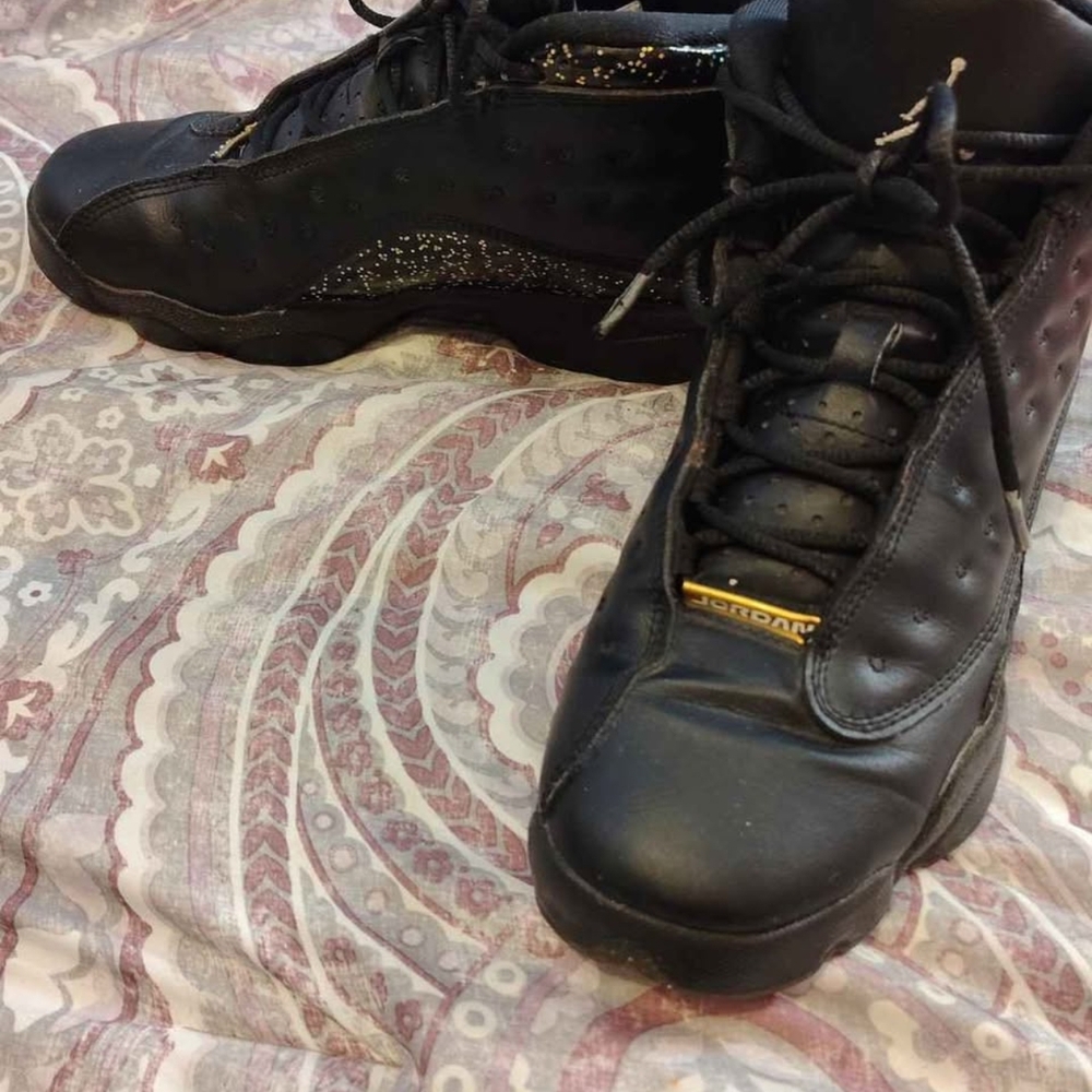Nike Black Sneakers with Gold Details